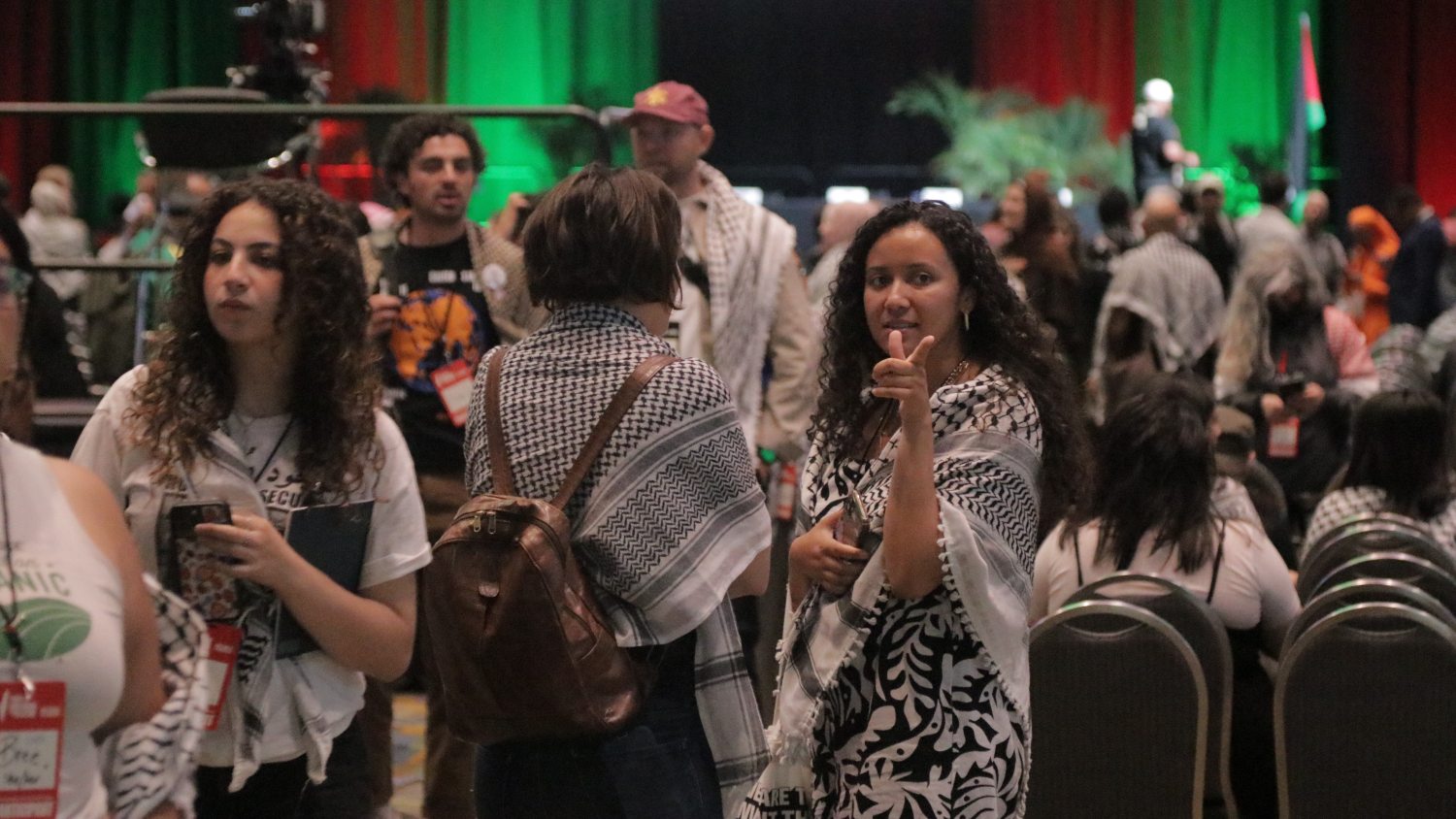 Attendees leave the Grand Riverview Ballroom, renamed Walid Daqqa hall after the Palestinian prisoner who died in April, during the People's Conference for Palestine on 26 May 2024.