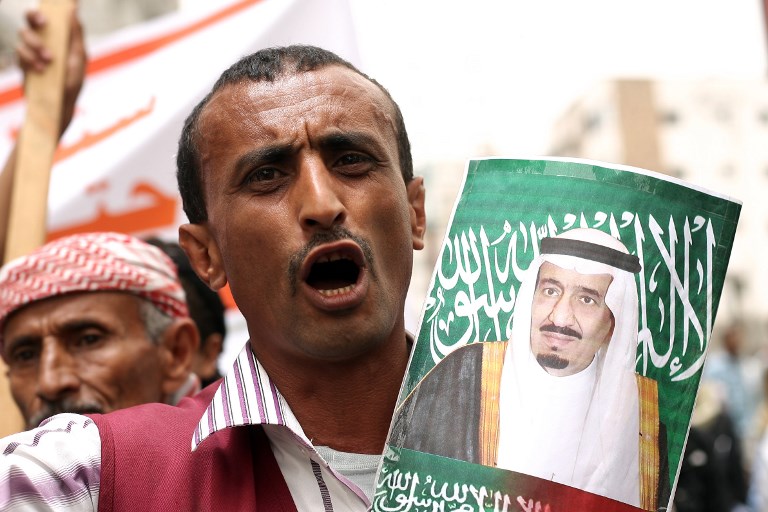 A Yemeni supporter of the Saudi-led coalition’s intervention, demonstrating in Taiz in April 2015 (AFP)