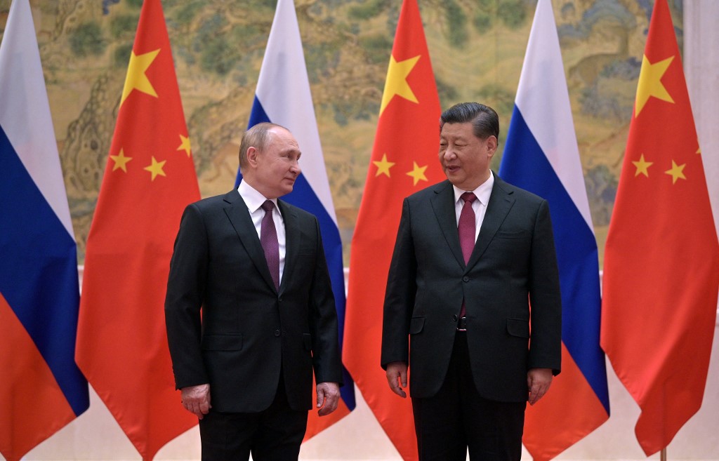 Russian President Vladimir Putin and Chinese President Xi Jinping meet in Beijing on 4 February 2022 (AFP)