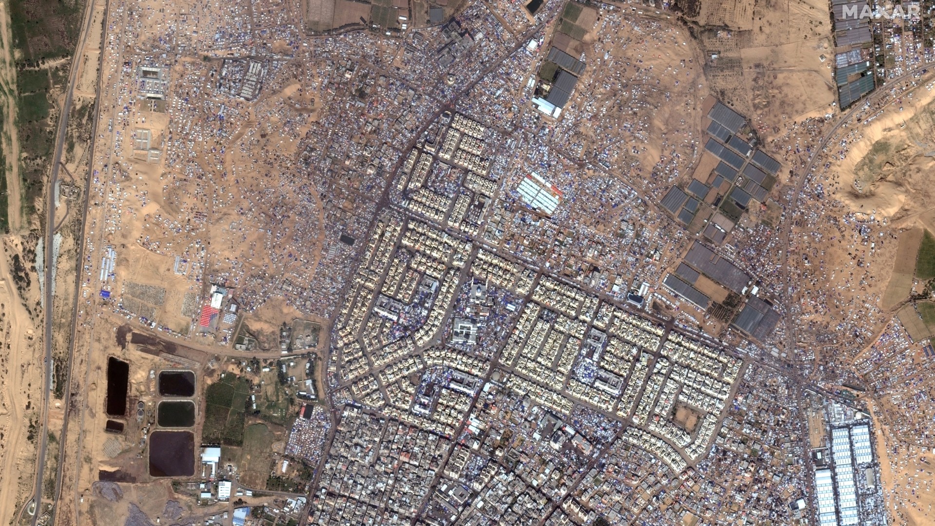 A satellite image shows tent shelters for displaced people in Rafah, Gaza, 7 February (Maxar Technologies/Reuters)