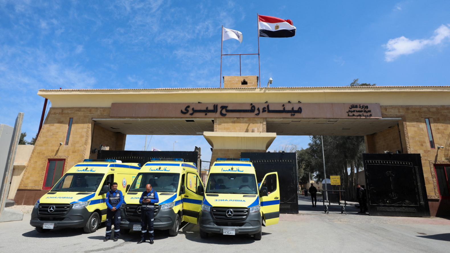 Ambulances parked in front of the Rafah border crossing between Egypt and Gaza on 23 March, 2024 (Reuters/Mohamed Abd El Ghani)