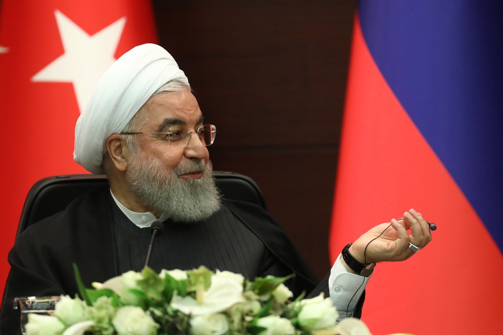 Iranian President Hassan Rouhani speaks in Ankara on 16 September (AFP)