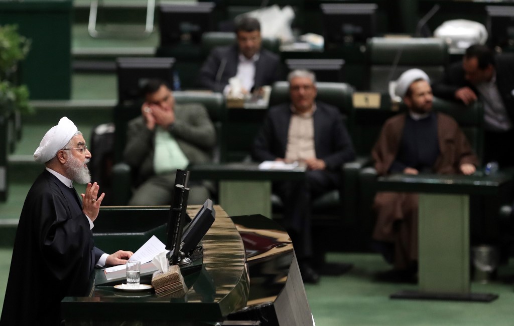 Iranian President Hassan Rouhani speaks to parliament in Tehran on 8 December (AFP)