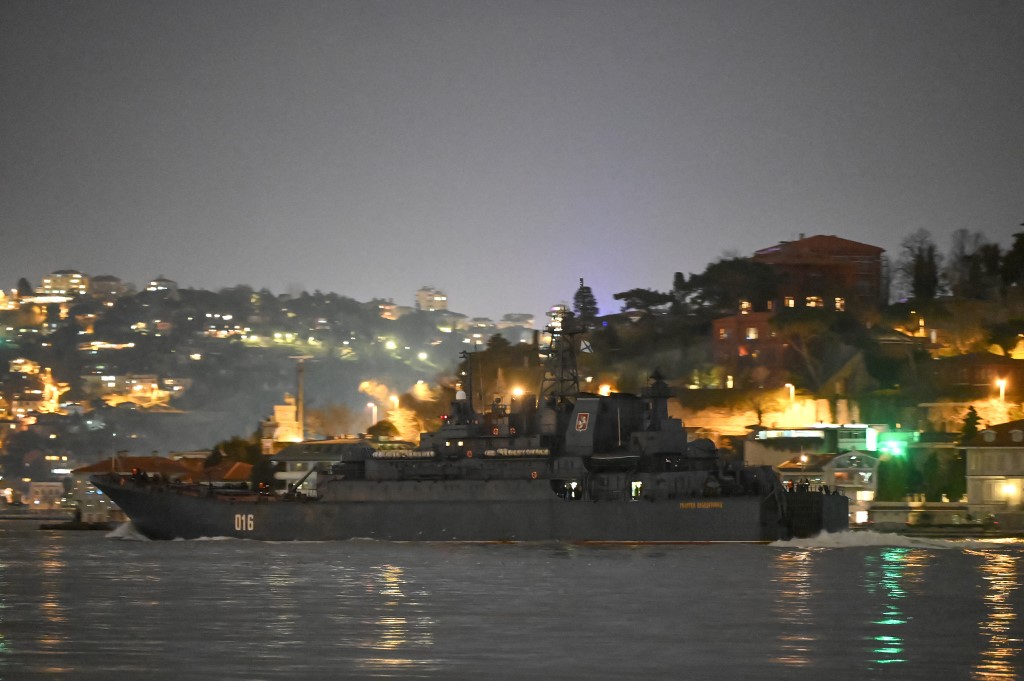 A Russian navy vessel sails through the Bosphorus Strait on 9 February 2022 (AFP)