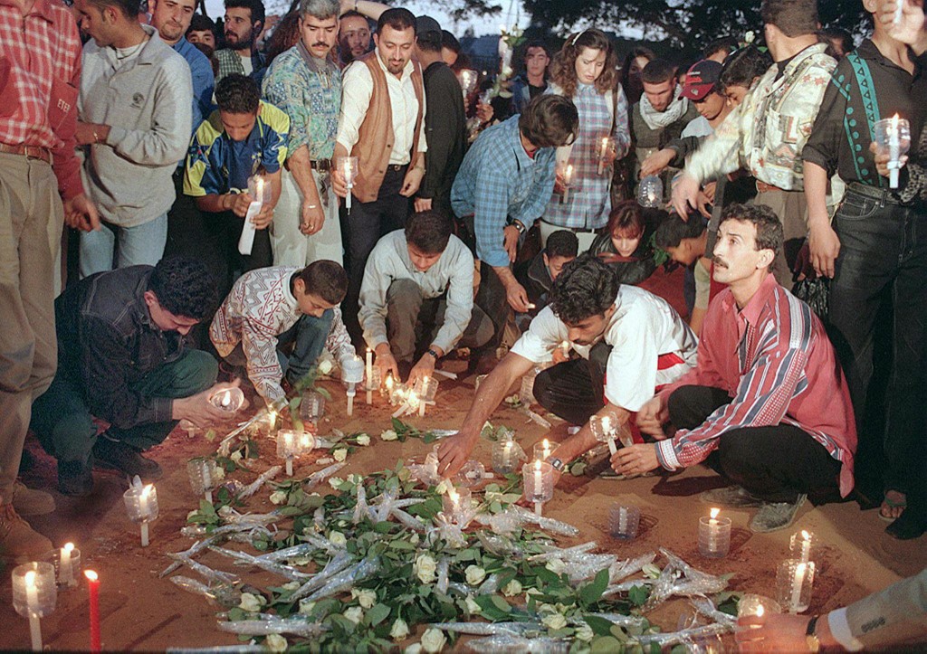 People commemorate the victims of Lebanon’s 1982 Sabra and Shatila massacre (AFP)