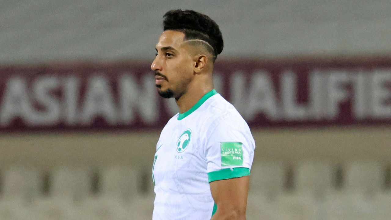 Saudi Arabia's Salem Al-Dawsari reacts during the 2022 Qatar World Cup Asian Qualifiers football match against China at the Sharjah Football Stadium in the Emirati city, on 24 March, 2022 (AFP)