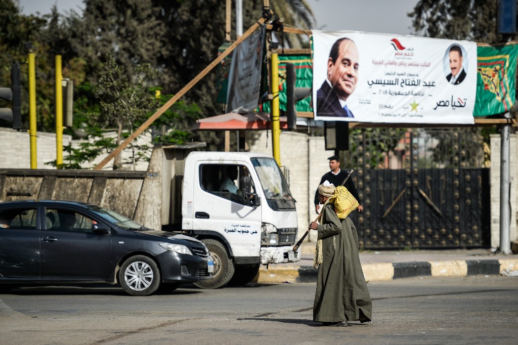 A poster of Egyptian President Abdel Fattah al-Sisi is pictured in Cairo in 2018 (AFP)