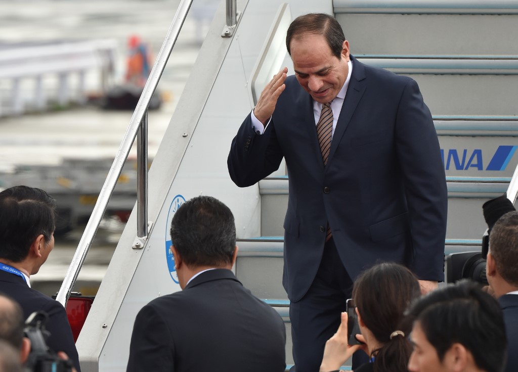 Egyptian President Abdel Fattah al-Sisi arrives in Japan on 27 June (AFP)