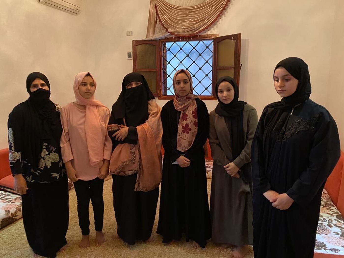 Rabia al-Jaballah, third from right, and other women of her family (MEE/Daniel Hilton)