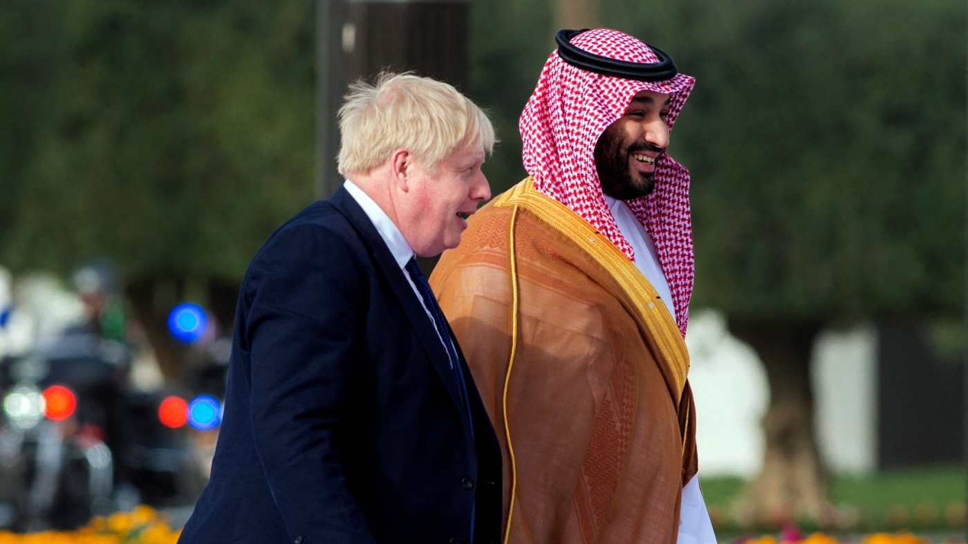 Saudi Arabia's Crown Prince Mohammed bin Salman welcoming British Prime Minister Boris Johnson at the Al-Yamama Palace in Riyadh on March 16, 2022. (AFP)