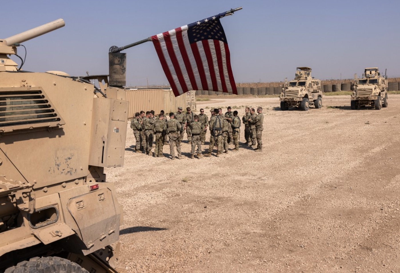 US army soldiers prepare to go out on patrol from a remote combat outpost on 25 May 2021 in northeastern Syria (AFP)