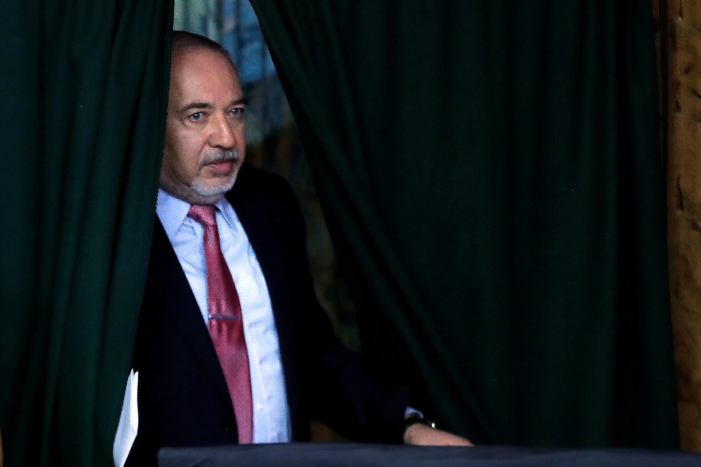 Avigdor Lieberman arrives to deliver a statement in 2019 (Reuters)