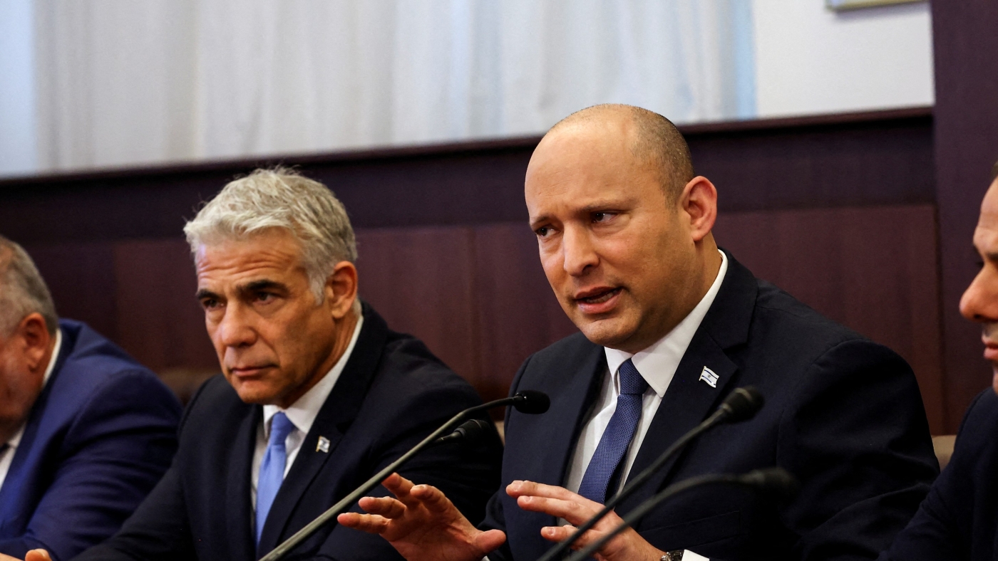 Israeli Prime Minister Naftali Bennett and Israeli Foreign Minister Yair Lapid attend a cabinet meeting in Jerusalem on 22 May 2022. (Reuters)