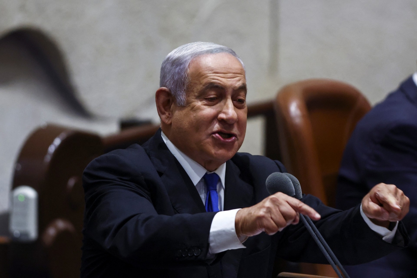 Benjamin Netanyahu speaks at the plenum at the Knesset, Israel's parliament, in Jerusalem on 30 June (Reuters)