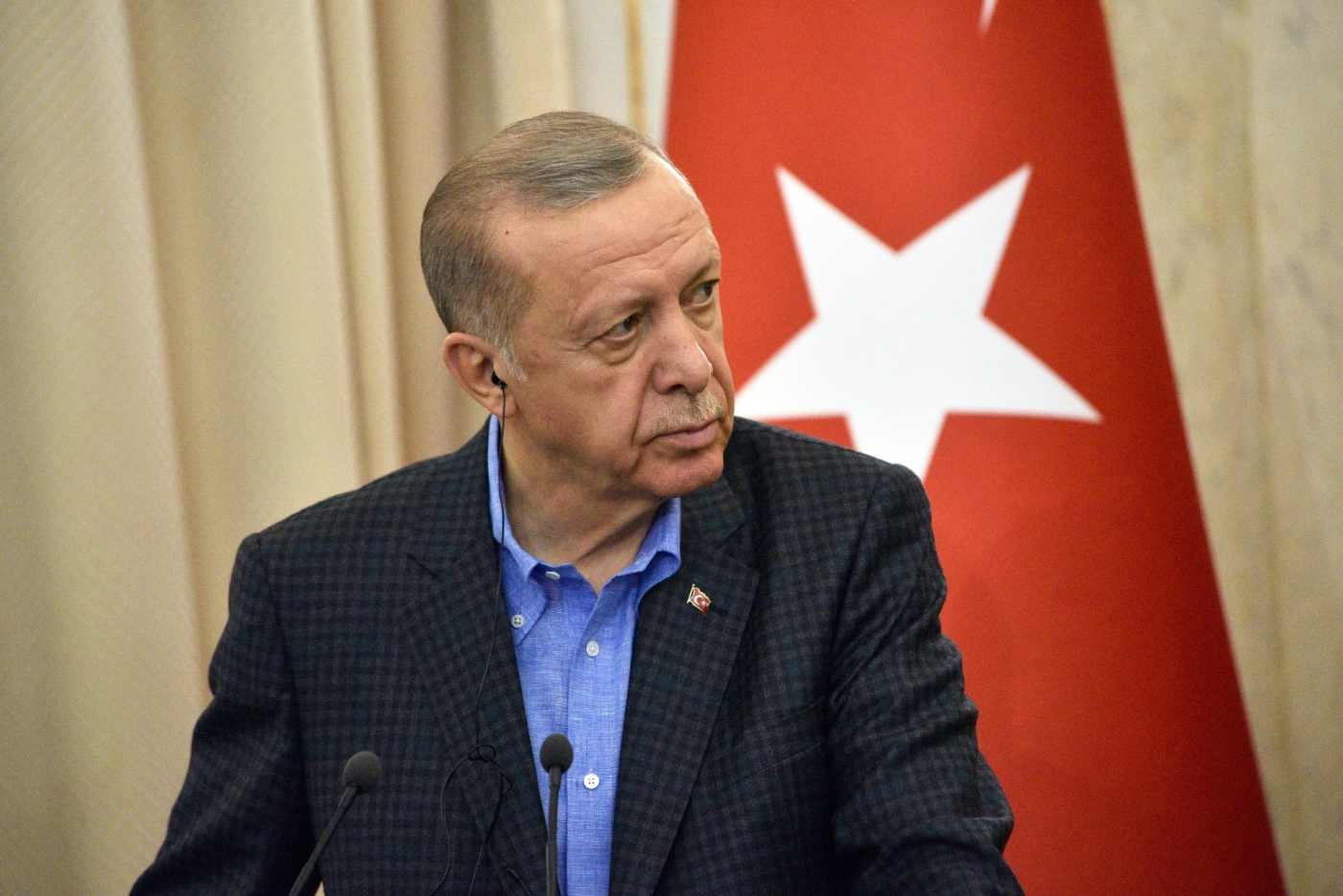 Recep Tayyip Erdogan attends a press conference in Lviv, Ukraine on 18 August (Reuters)