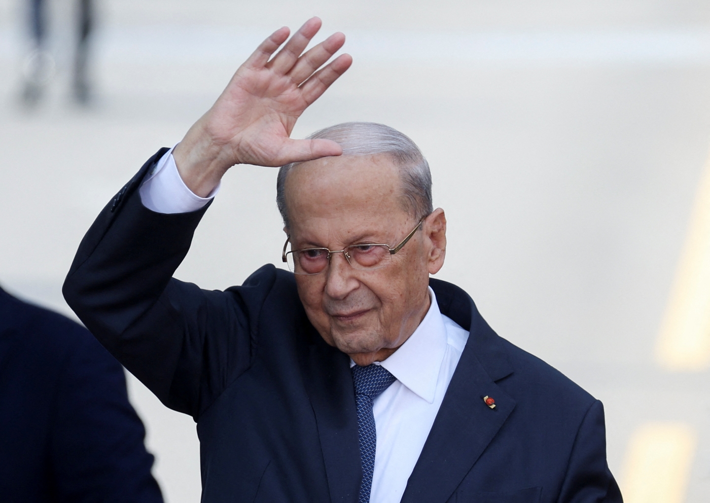 Lebanese outgoing President Michel gestures to his supporters as he leaves the presidential palace a day before his six-year term officially ends, in Baabda, Lebanon 30 October 2022 (Reuters)