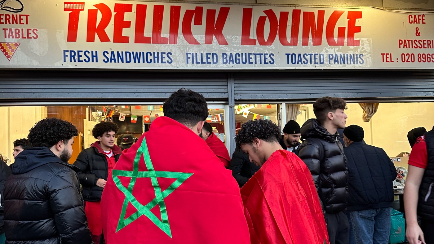 Moroccan fans in Ladbroke Grove wait to get inside the Trellick Lounge on Golborne Road before their World Cup semi-final match against France (MEE/Mohamed Saleh) 