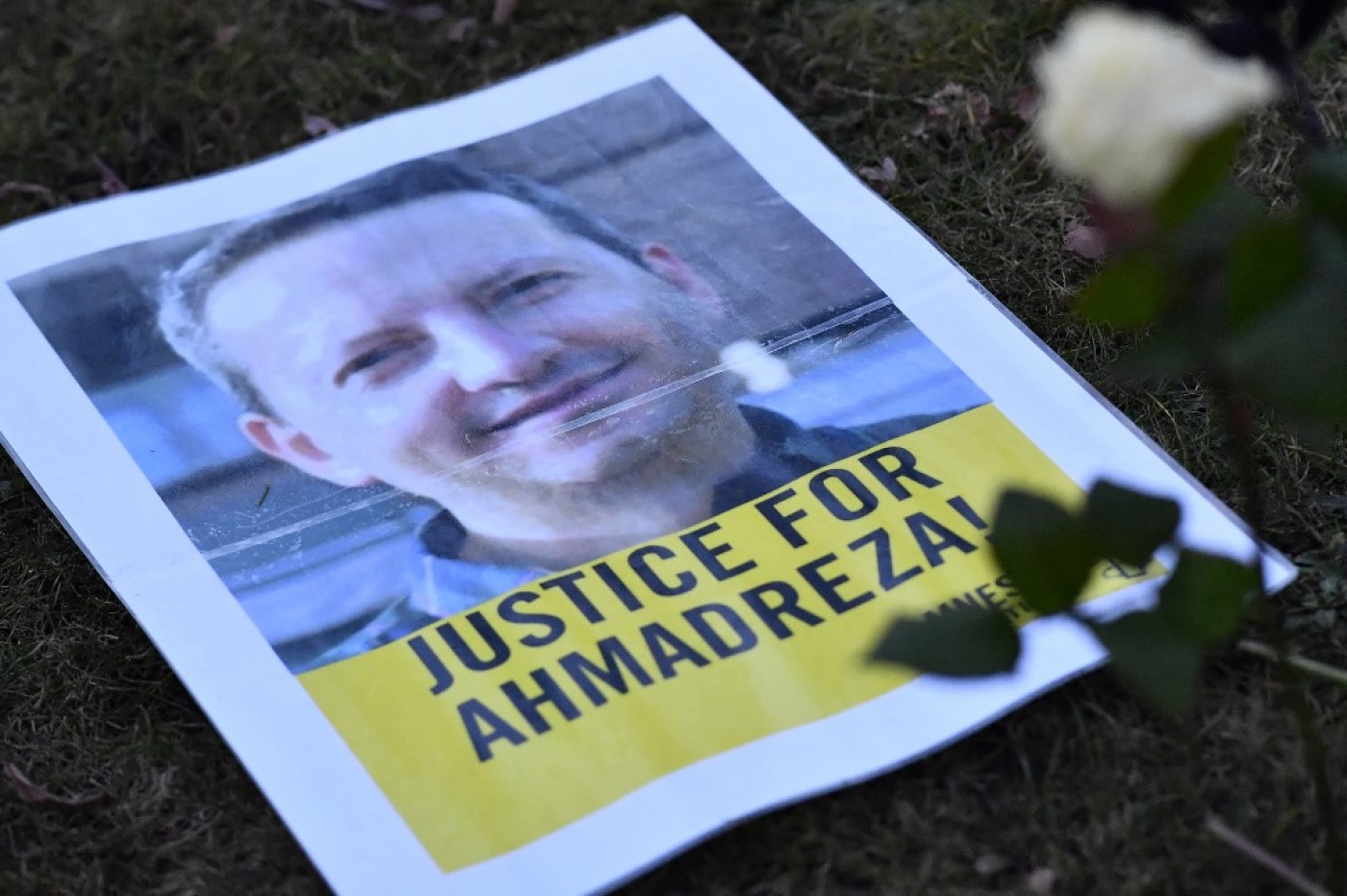 A leaflet during a protest in February 2017 outside the Iranian embassy in Brussels for Ahmadreza Djalali, a Swedish-Iranian academic sentenced to death in Tehran (AFP)