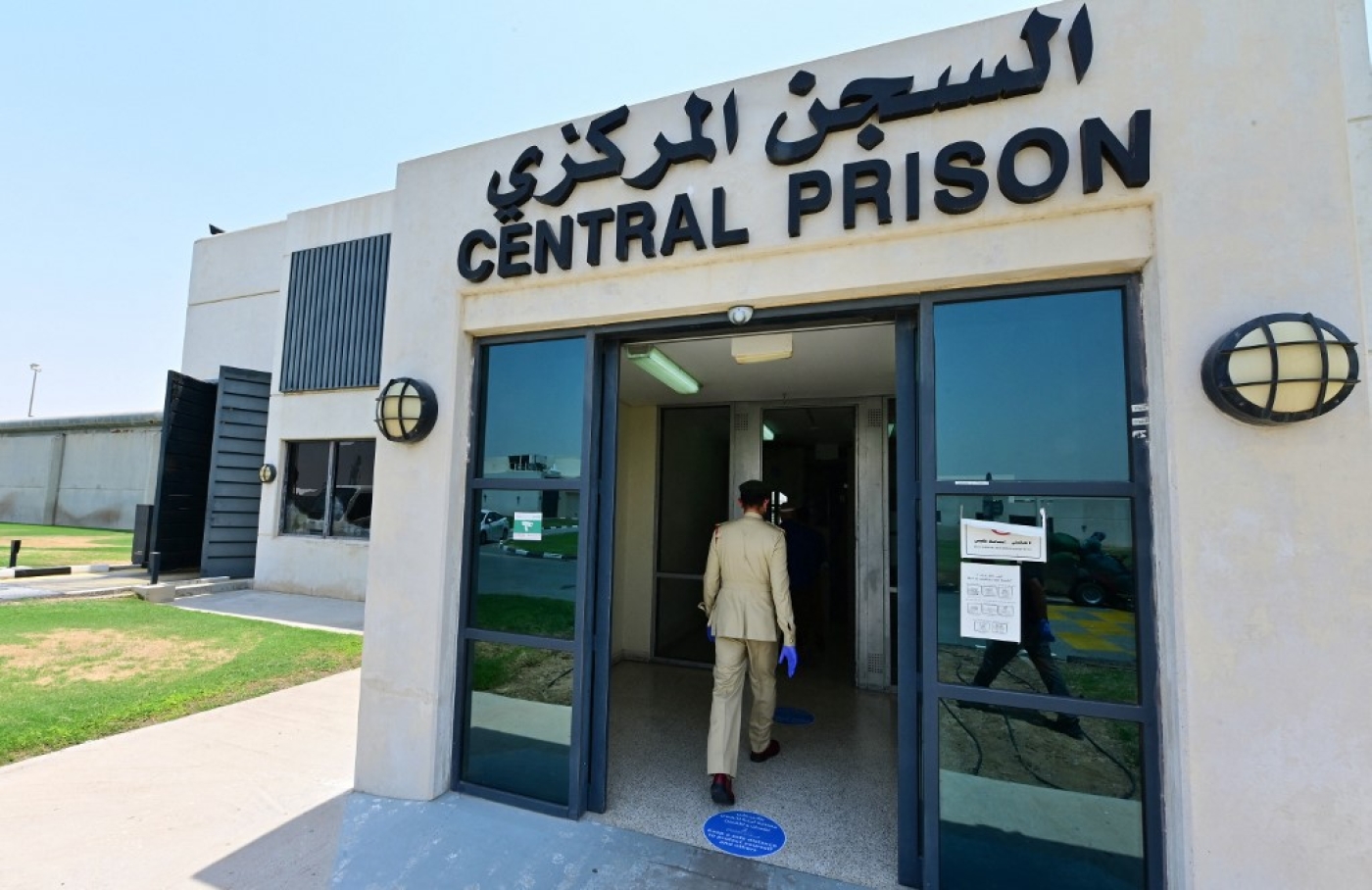 A policeman enters Dubai's Al-Awir central prison in the United Arab Emirates
