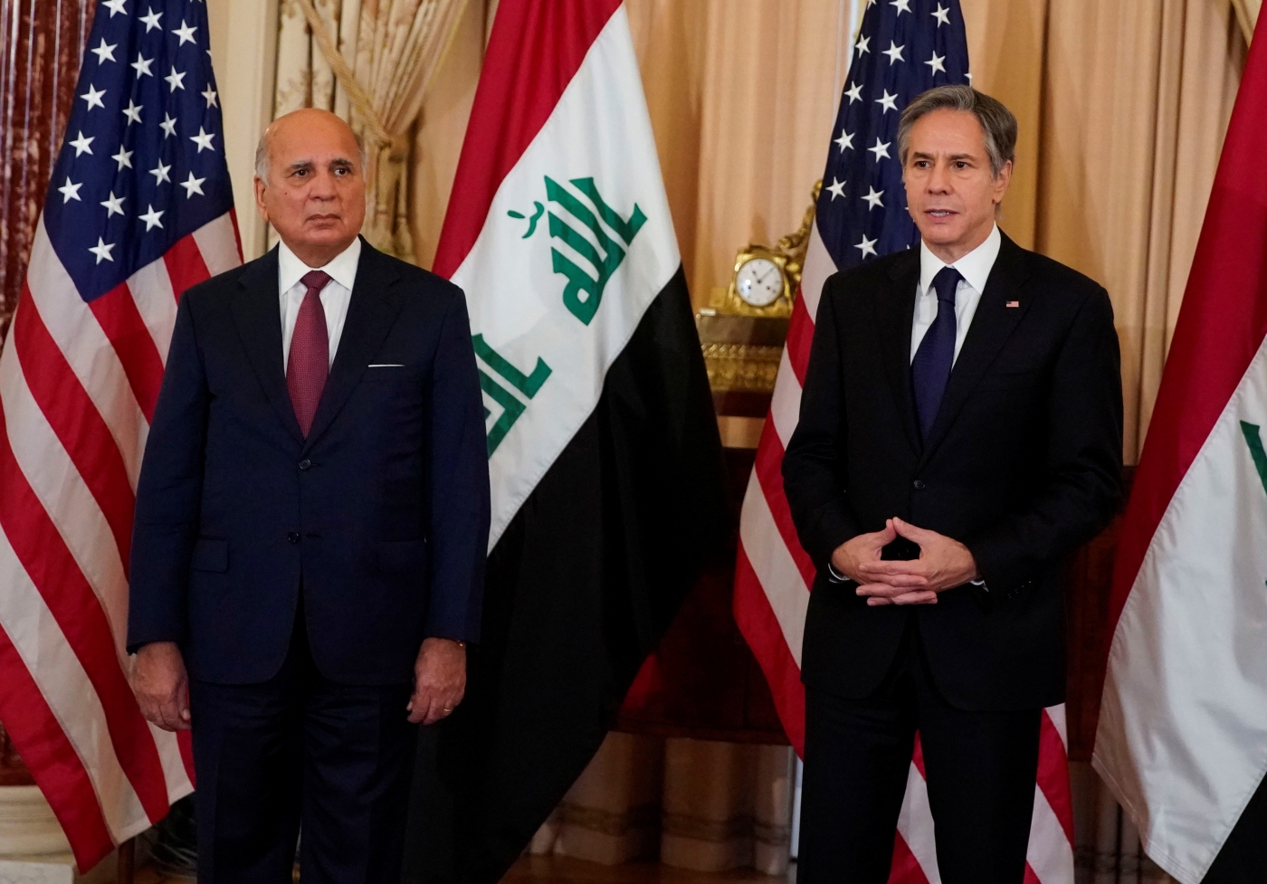 Iraq’s Foreign Minister Fuad Hussein (L) and US Secretary of State Antony Blinken