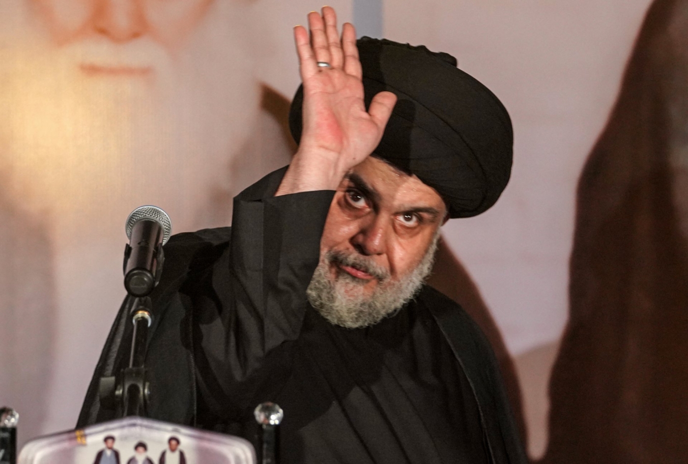 Muqtada al-Sadr, speaking in Najaf, on 3 June. One onlooker described the cleric as being "at the height of his glory" prior to his withdrawal from politics (AFP)