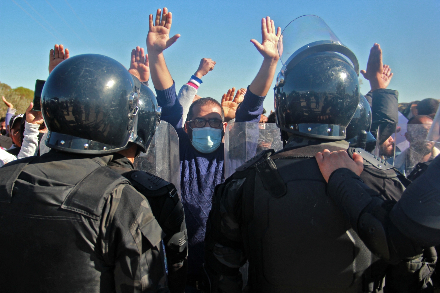 Tunisian security forces face anti-government demonstrators