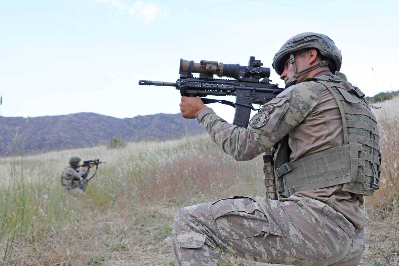 A Turkish soldier pose for cameras during a military operation against the PKK (Handout)