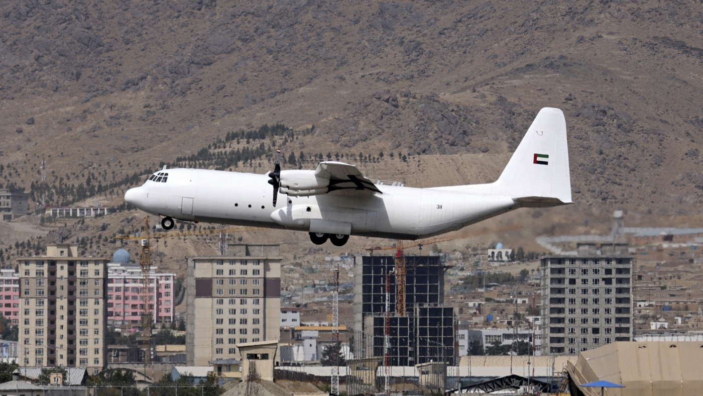 An aircraft carrying humanitarian aid from the United Arab Emirates prepares to land at the airport in Kabul on 12 September 2021 (AFP)