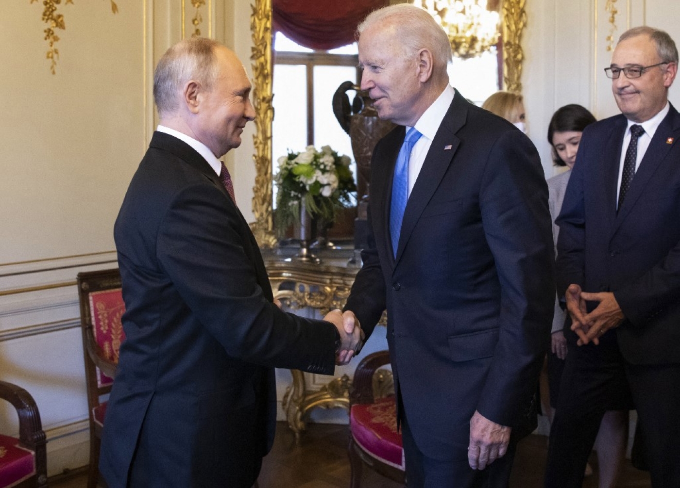 US President Joe Biden shakes hands with Russian President Vladimir Putin prior to the US-Russia summit in Geneva.