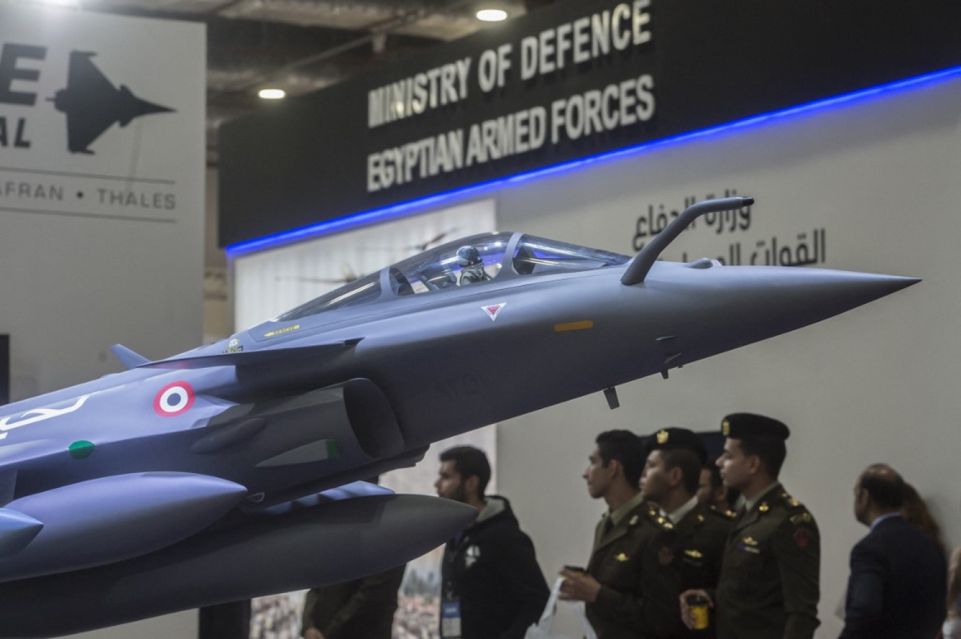 A model of the French made Rafale jet fighter is displayed during Egypt’s first Service Defence Exhibition in Cairo on 3 December 2018, at the International Exhibition Center (AFP)
