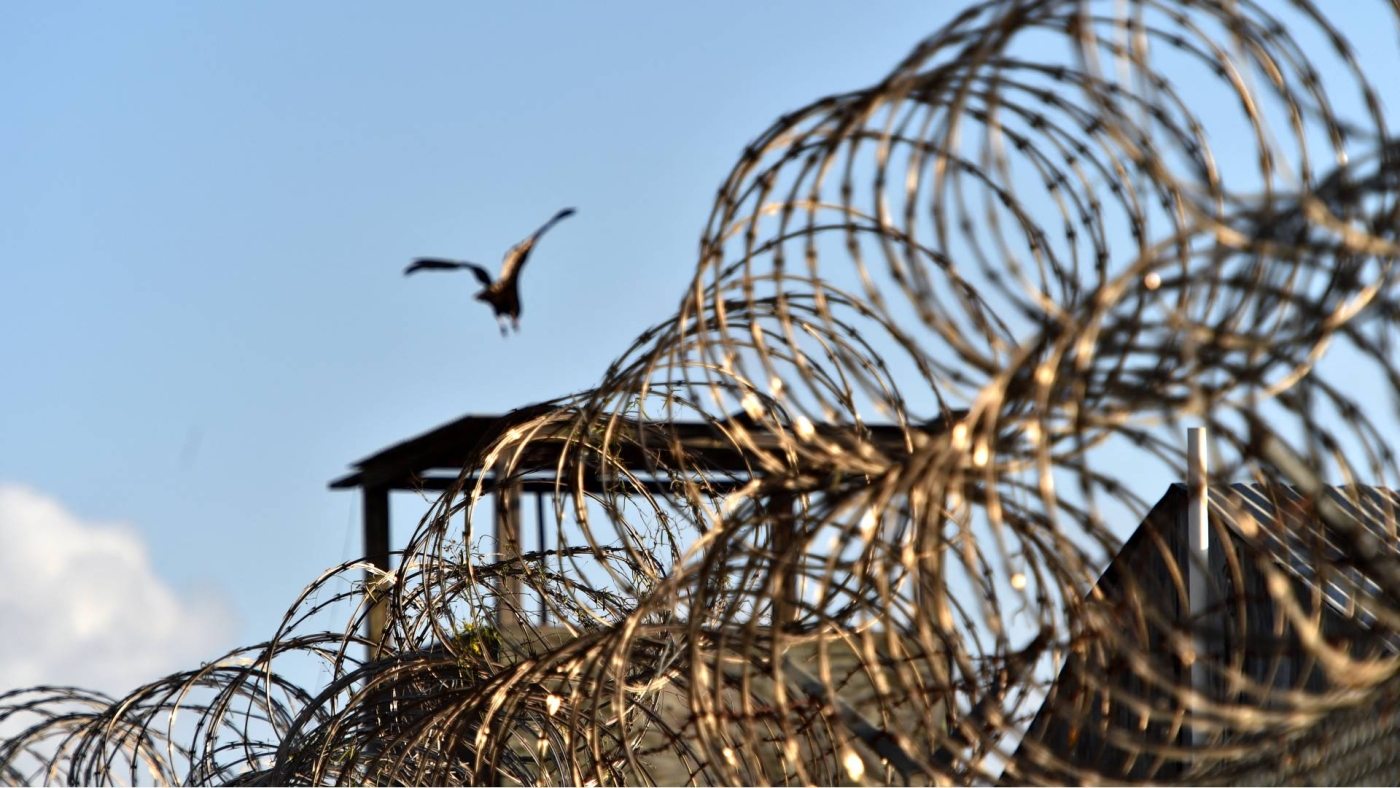 A razor wire-topped fence at the detention facility in Guantanamo Bay, Cuba, on 9 April 2014. Several detainees were sent here after being tortured at CIA black sites.
