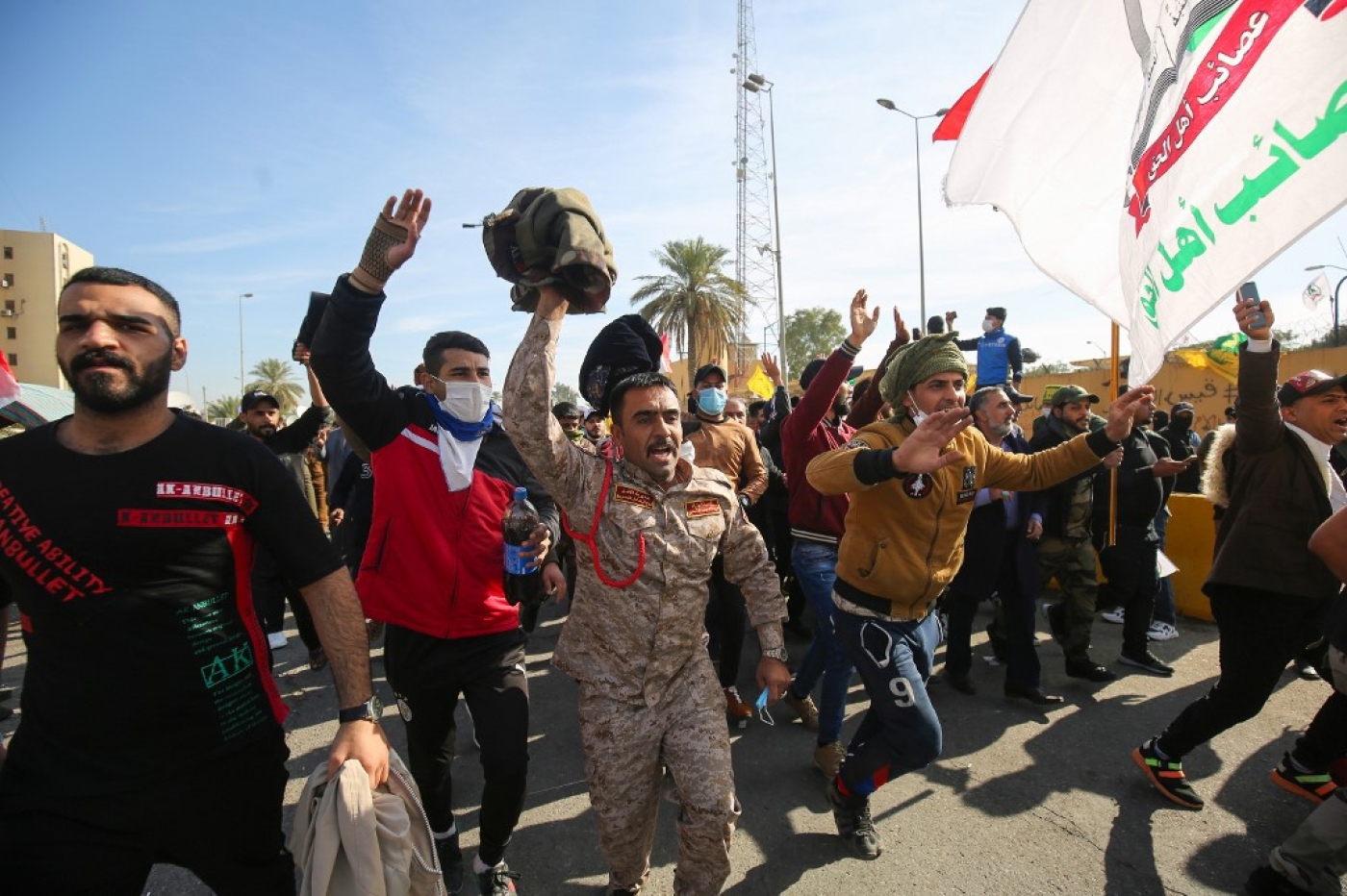 The Iran-backed Hashd al-Shaabi protest outside the US embassy in Baghdad on 1 January 2020