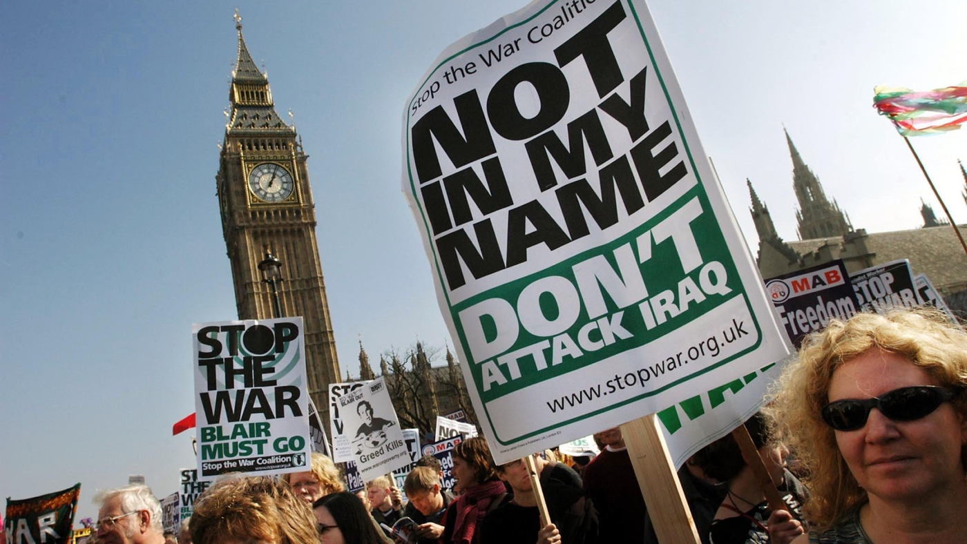 Anti-war demonstrators opposed to military action in Iraq walk past The Houses of Parliament on their way to a rally in London's Hyde Park on 22 March 2003 (AFP)