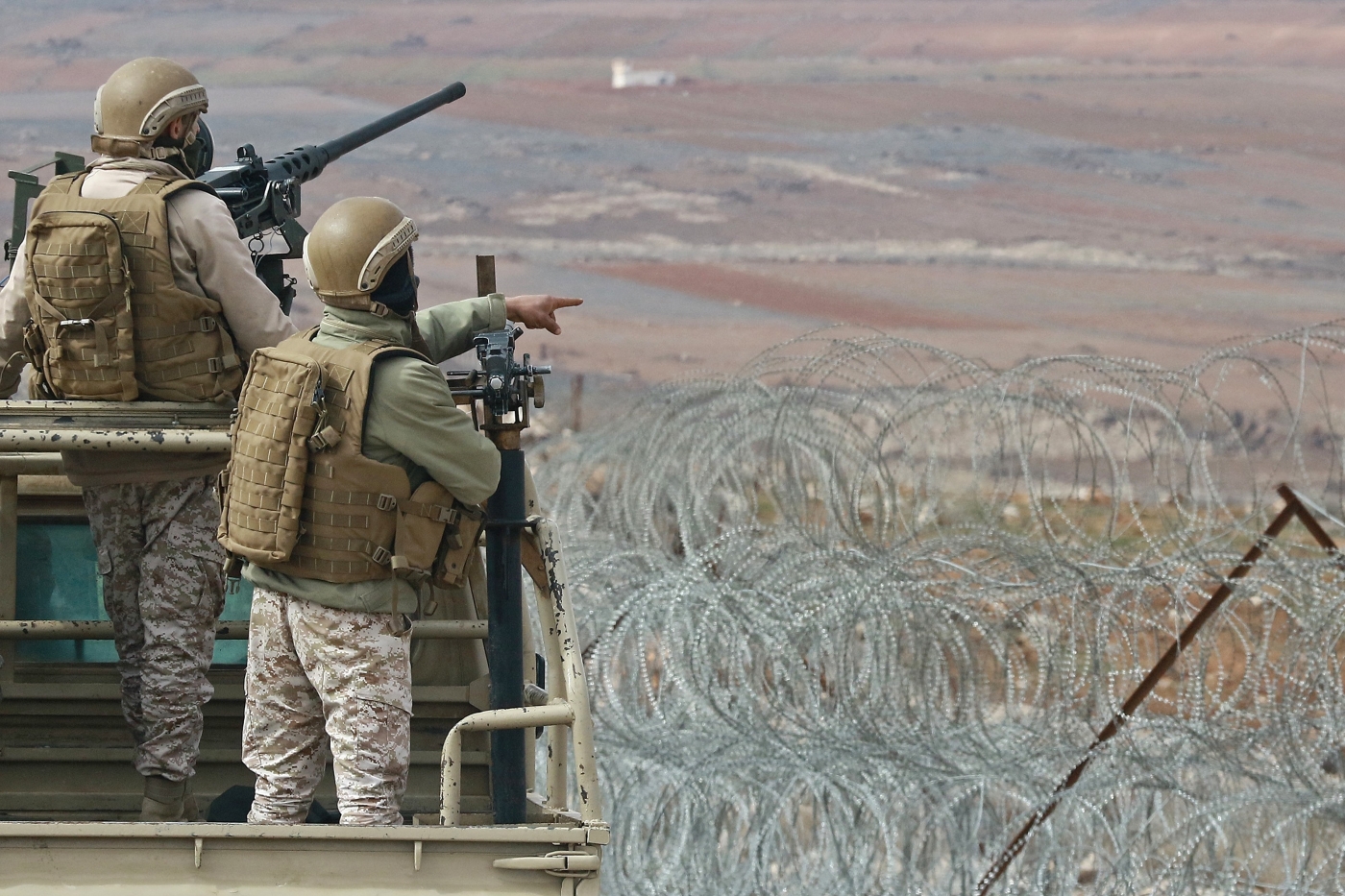 Jordanian soldiers patrol along the border with Syria to prevent trafficking during a tour organised by the Jordanian Army on 17 February 2022. (AFP)