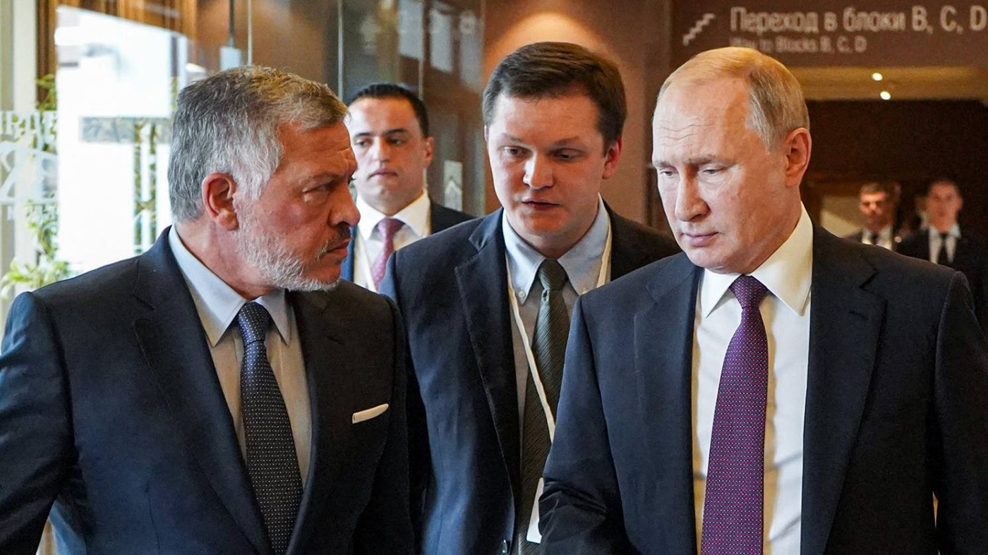 Jordanian King Abdullah II (R) walks with Russian President Vladimir Putin (L) during their meeting at the Valdai Discussion Club in Sochi on 3 October 2019.