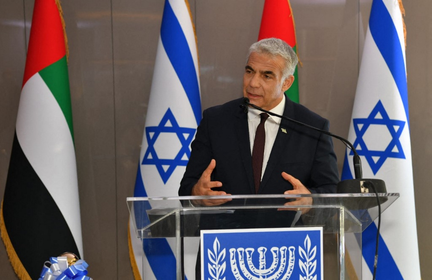 Israel's alternate Prime Minister and Foreign Minister Yair Lapid speaks at a press conference at the new Israeli consulate in Dubai on 30 June