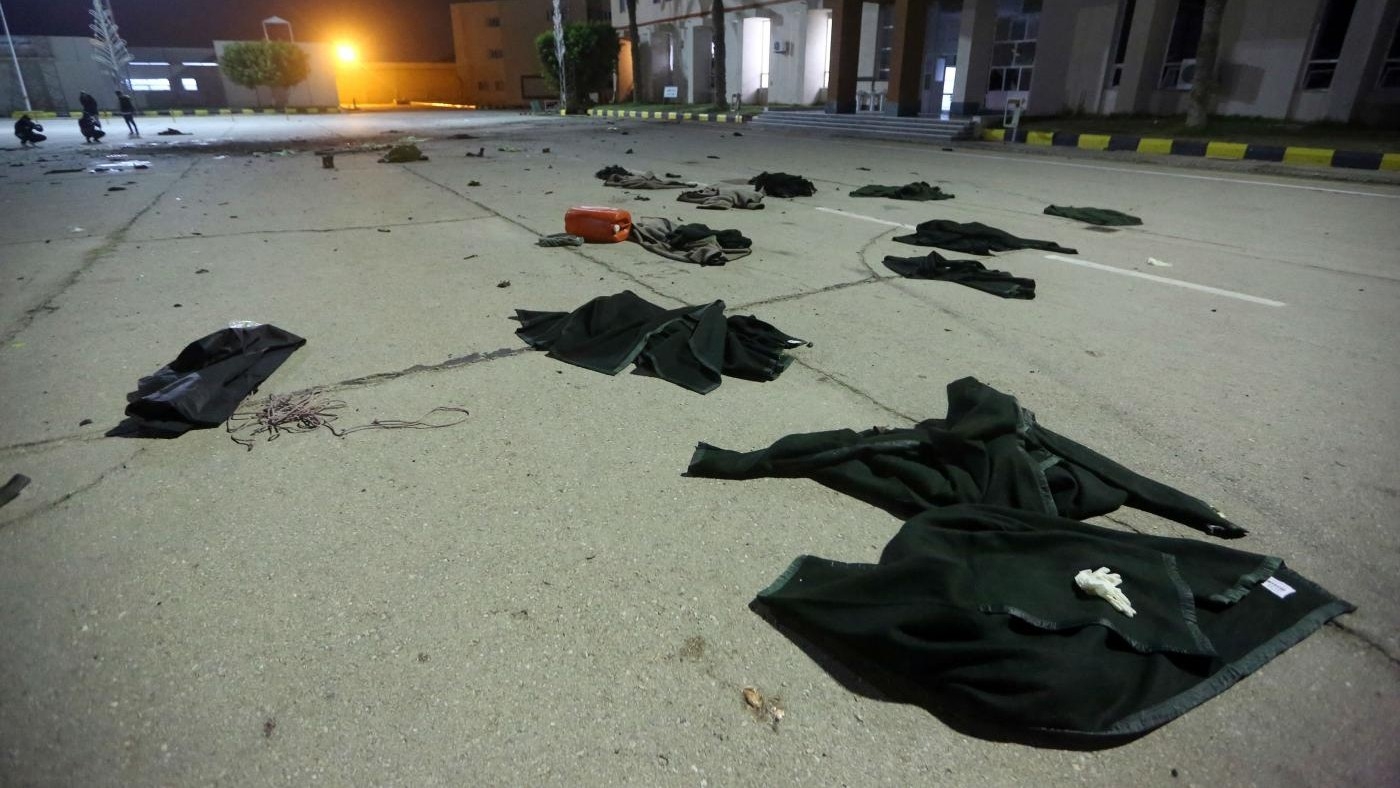 Damage on the concrete and clothing from a drone strike is seen at a Military College in Al-Hadaba region in the Libyan capital Tripoli, on 4 January 2020.