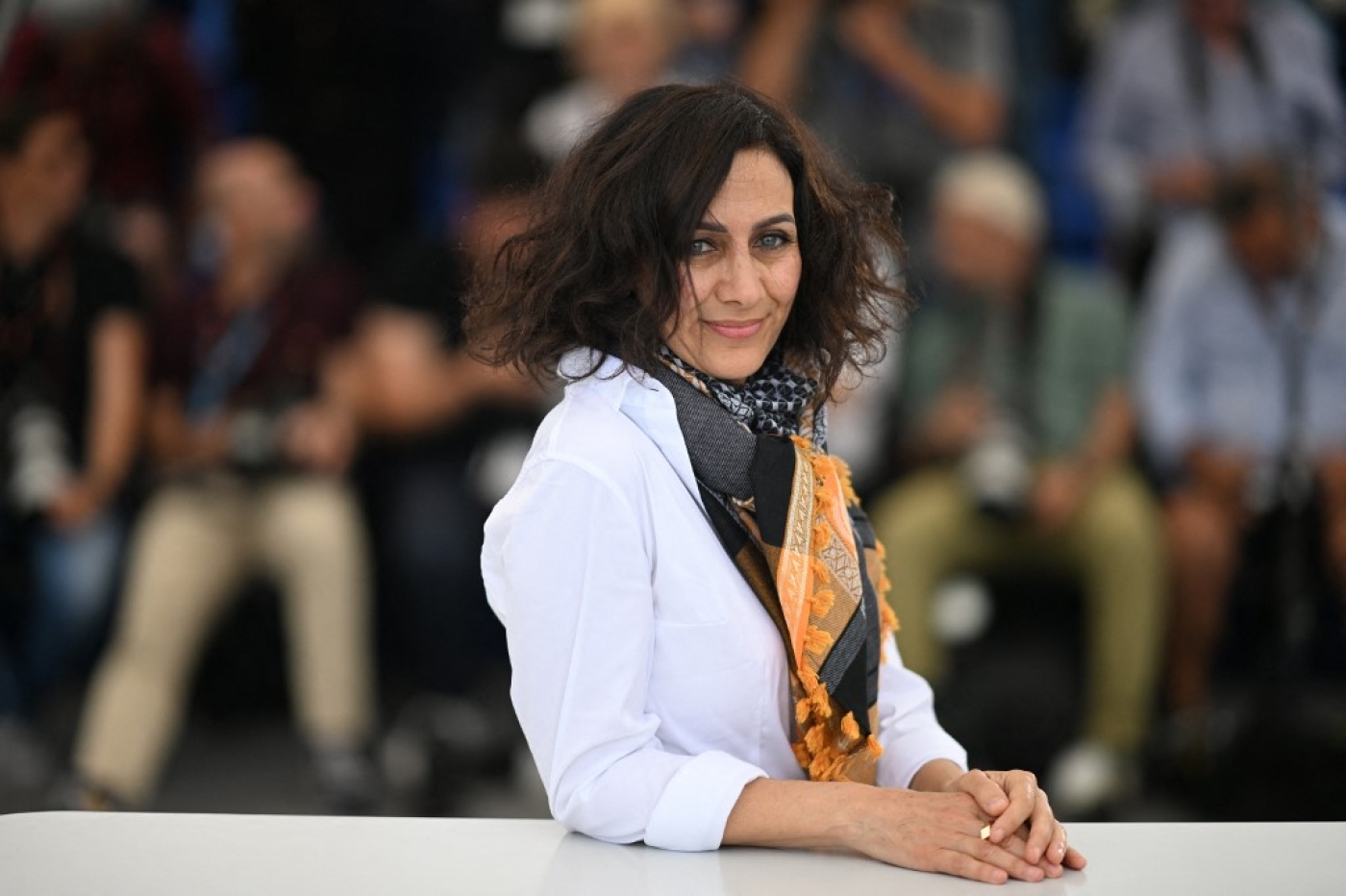 The director of Mediterranean Fever, Maha Haj, is photographed at the 75th edition of the Cannes Film Festival in Cannes, southern France, on 25 May 2022 (AFP)