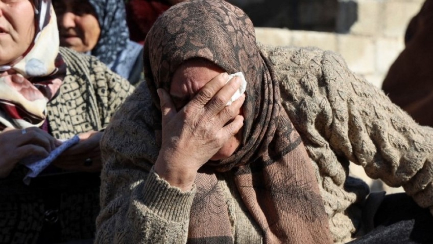 Syrian women mourn victims of the earthquake in the town of Jindayris, Syria (AFP)