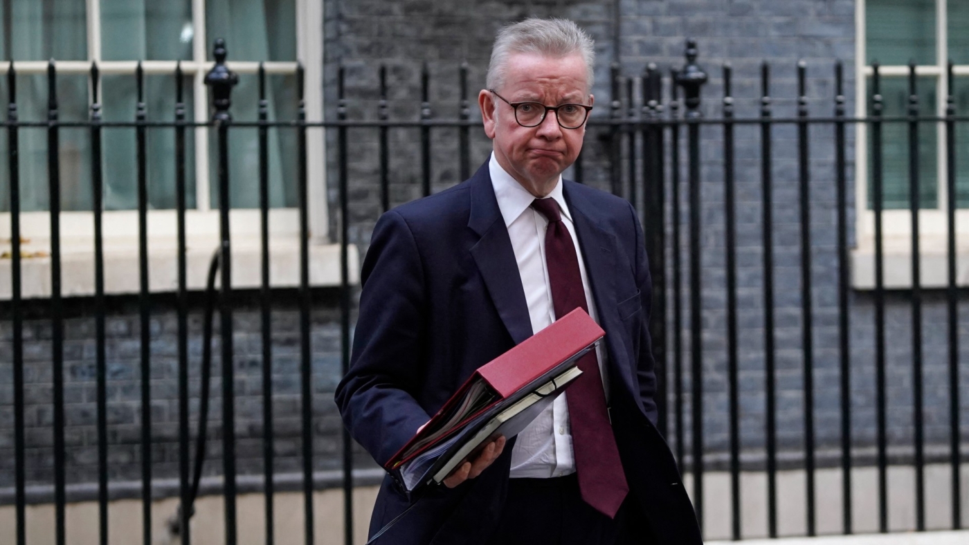 Communities Secretary Michael Gove leaves after attending the first cabinet meeting under Prime Minister Rishi Sunak in 10 Downing Street on 26 October 2022 (AFP)