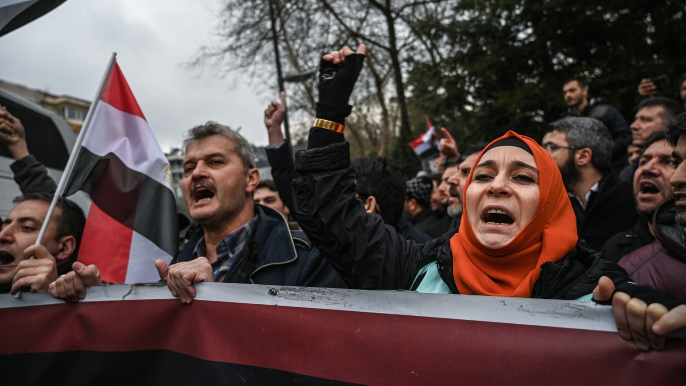 People shout slogans and hold flags in front of the Egyptian consulate in Istanbul during a protest against Egyptian authorities on 2 March 2019 (AFP)