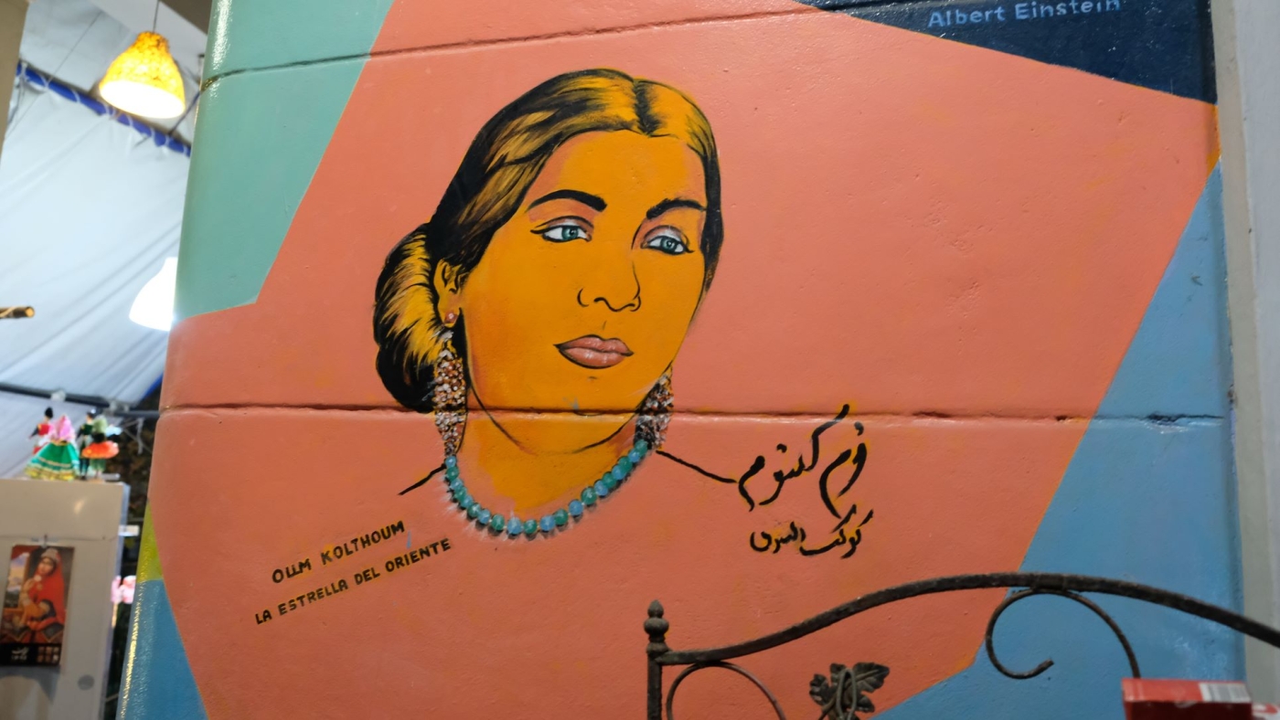A mural of Egyptian singer Umm Kulthum at the Topoly restaurant (Matthew Petti)