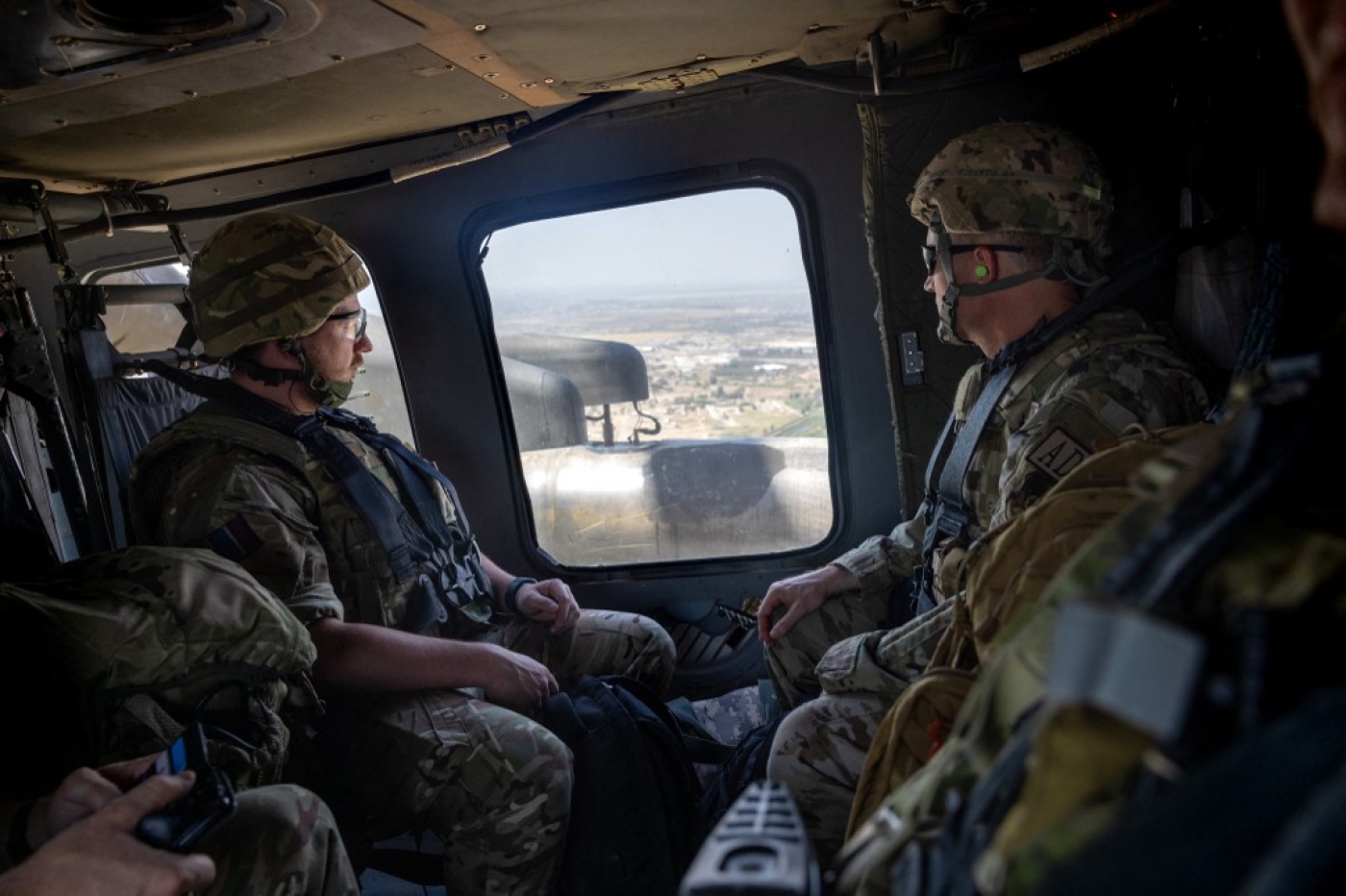 Coalition soldiers fly to Baghdad in a US Blackhawk helicopter on 31 May 2021.