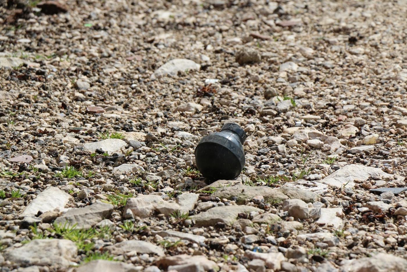 Remnants of a sound bombs set off by the soldiers in front of Abu Srour's home (MEE/Akram al-Waara)