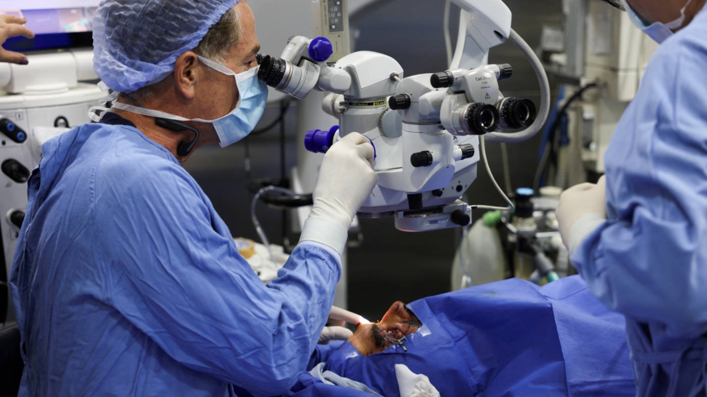 Eye surgeon and Lebanese lawmaker Elias Jrade operates on a man injured during p[ager explosions across Lebanon on 18 September 2024