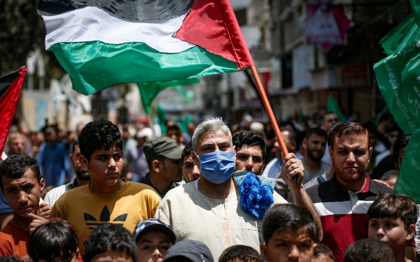 Des Palestiniens de Gaza participent à une manifestation organisée par le Hamas contre les projets d’annexion israéliens en juin 2020 (AFP)