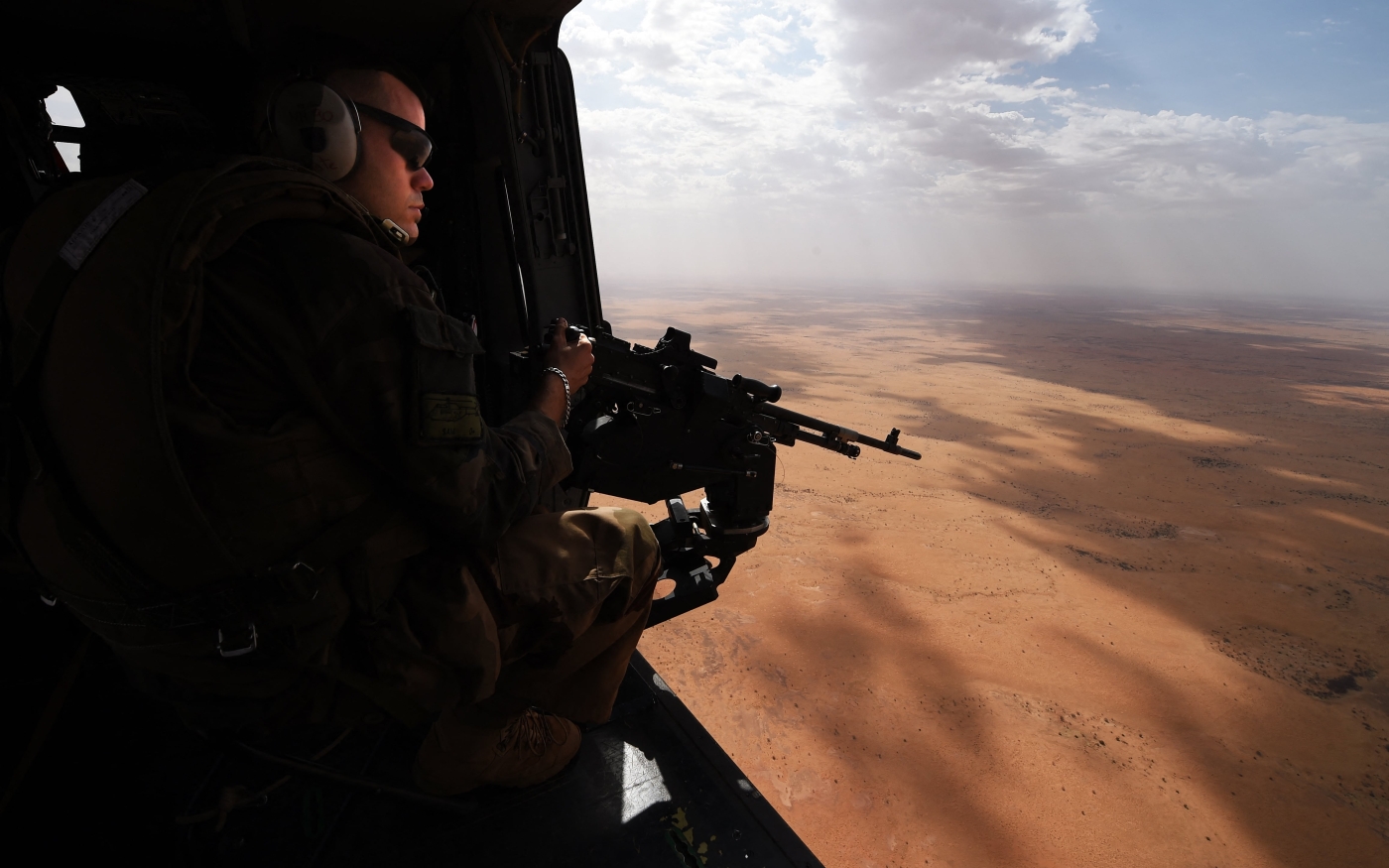 A French soldier of the operation Barkhane in a tiger helicopter during a tactical flight on 12 March 2016 in Mali. (Pascal Guyot/AFP)