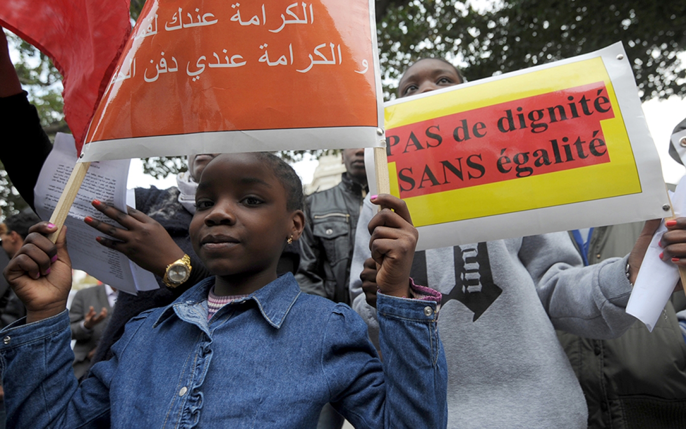 Une fillette tunisienne lors d’une manifestation contre la discrimination raciale à Tunis, le 21 mars 2014 (AFP)