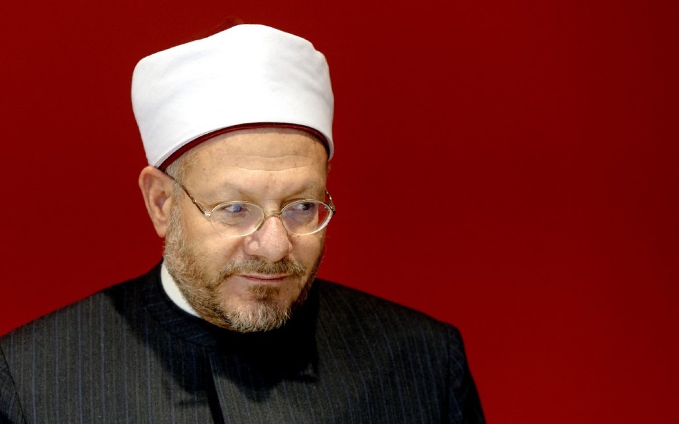Shawki Allam, l’actuel grand mufti d’Égypte, a statué par une fatwa en janvier 2018 sur l’interdiction par le droit islamique des échanges de cryptomonnaies en raison des risques qu’impliquent ces activités (AFP/Sander Koning)