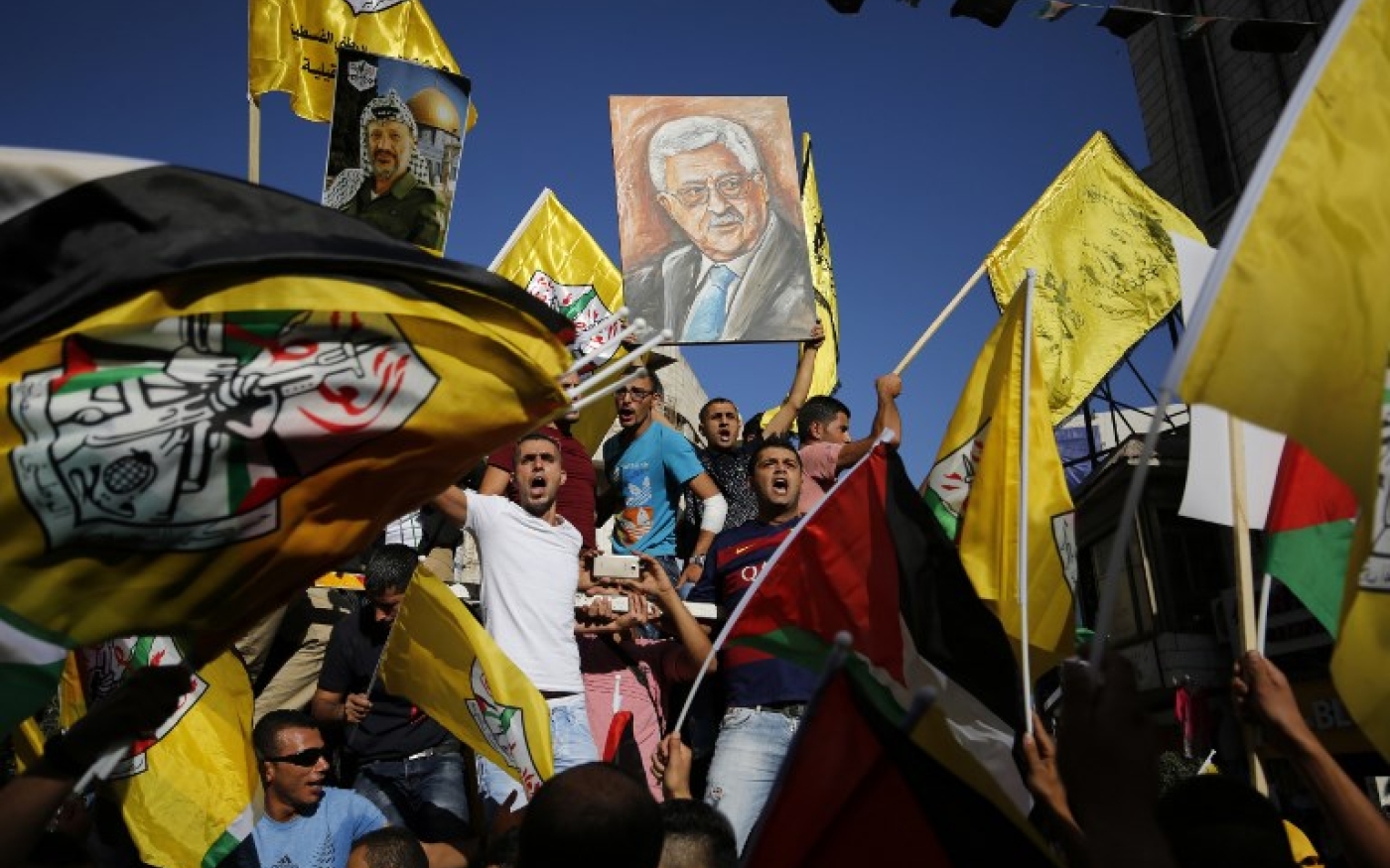 Des Palestiniens soutenant le Fatah manifestent à Ramallah en soutien à Mahmoud Abbas (AFP)